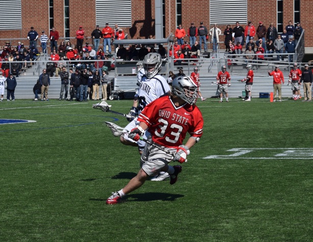 Ohio State midfielder Kacy Kipinos makes a move in a game against Penn State on March 29, 2015. Ohio State would go on to take the victory 10-8 after all most blowing a six goal lead in the fourth quarter. Photo by: Matt Custodio