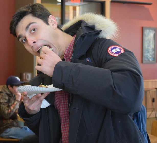 Heights resident Andrew Capanelli enjoys a taco during the Heights Taco Tuesday February 17, 2015. Taco Tuesday is one of the many events held by the Heights Housing Complex to bring in new residents. Photoby: Matt Custodio 